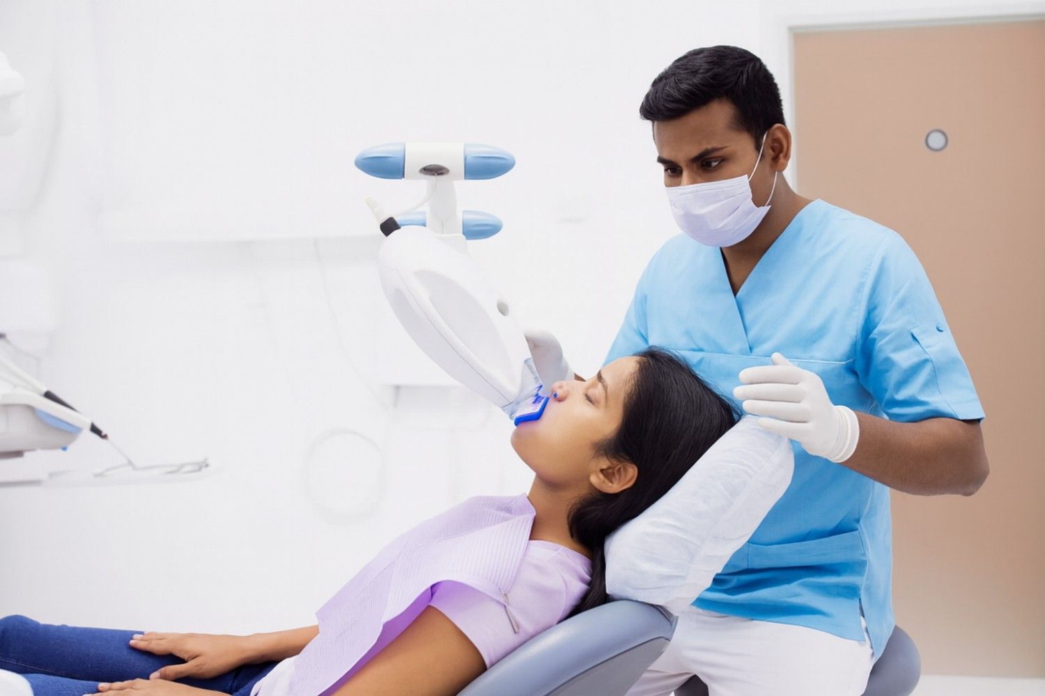 Patient Receiving Dental Treatment by Digital Scanner